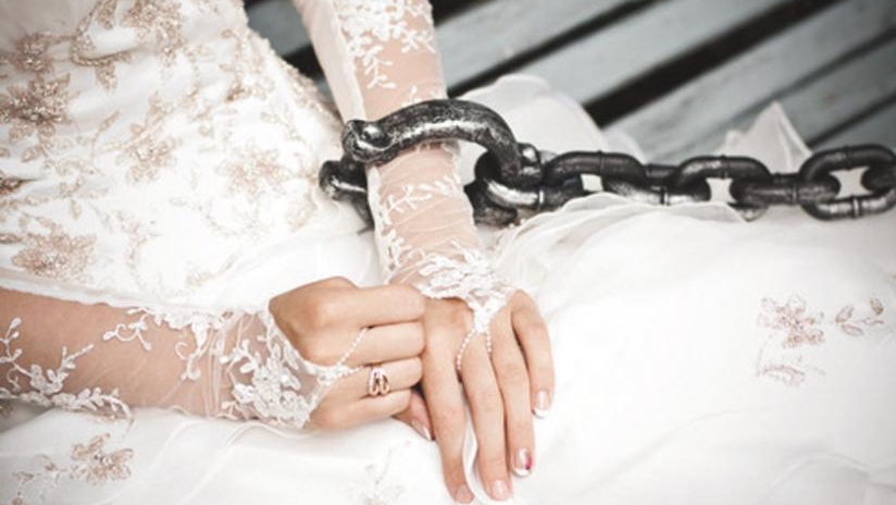 Bride with slave chain
handcuff