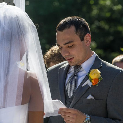 Groom reading personal
vows
