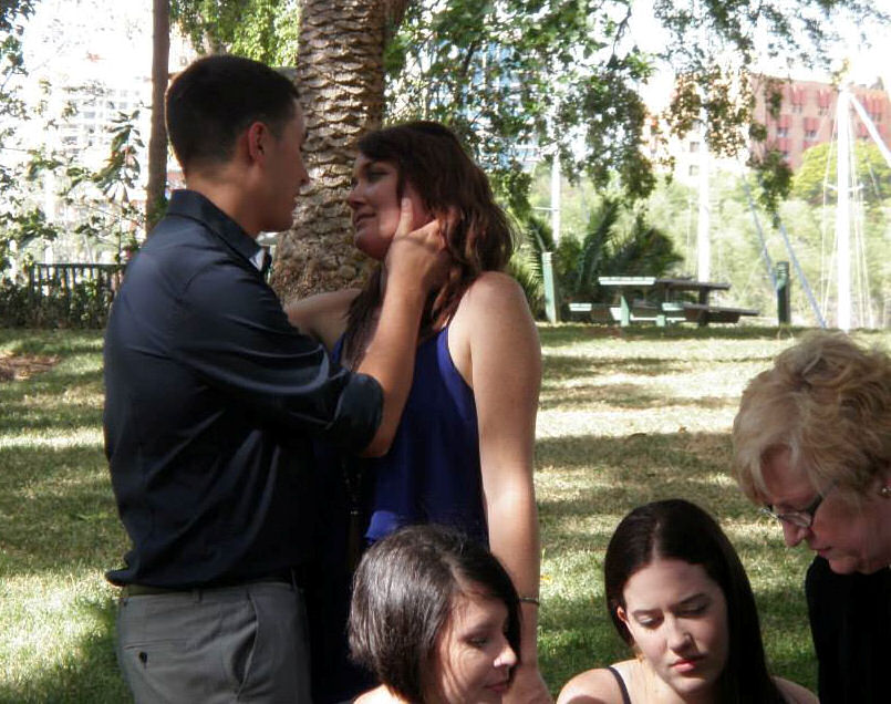 Emma and Sean share a private moment while
their witnesses are signing the Register after their
marriage by Jennifer Cram, Brisbane Wedding
Celebrant